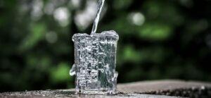 Clean water being poured into a glass